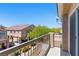 Balcony with a neighborhood view and wrought-iron railing at 1069 Thrill Ct # 102, Henderson, NV 89002