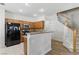 Updated kitchen with modern appliances and breakfast bar at 1069 Thrill Ct # 102, Henderson, NV 89002