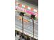 Aerial view of F1 race on Las Vegas Grand Prix race course with palm trees at 135 E Harmon Ave # 2515, Las Vegas, NV 89109