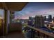 Balcony view overlooking the Las Vegas skyline at dusk, highlighting city lights and buildings at 135 E Harmon Ave # 2515, Las Vegas, NV 89109