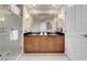 Modern bathroom featuring a double sink vanity, walk-in shower, and contemporary fixtures at 135 E Harmon Ave # 2515, Las Vegas, NV 89109