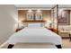 Beautiful bedroom with king bed, stylish decor, and separation screen for flexible living space at 135 E Harmon Ave # 2515, Las Vegas, NV 89109