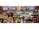 Charming cafe space with delicious pastries, menu boards, and cozy table seating at 135 E Harmon Ave # 2515, Las Vegas, NV 89109