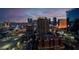 Dramatic city view of Las Vegas at night, with illuminated buildings and skyline at dusk at 135 E Harmon Ave # 2515, Las Vegas, NV 89109