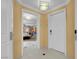 Spacious, modern entryway with white tile flooring, doorways to rooms, and overhead lighting at 135 E Harmon Ave # 2515, Las Vegas, NV 89109