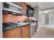 Contemporary kitchenette equipped with stainless steel appliances and elegant countertops at 135 E Harmon Ave # 2515, Las Vegas, NV 89109