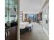 Comfortable main bedroom with city views, wet bar, desk, and seating area at 135 E Harmon Ave # 2515, Las Vegas, NV 89109
