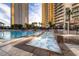 Relax in the luxurious pool area, with hot tub and comfortable lounge seating at 135 E Harmon Ave # 2515, Las Vegas, NV 89109