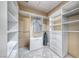 Walk-in closet with built-in shelving and drawers for optimal storage at 1862 Redwood Valley St, Henderson, NV 89052