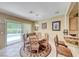 Light-filled dining room with sliding glass door and access to the backyard pool area at 1862 Redwood Valley St, Henderson, NV 89052