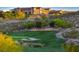 Scenic view of the lush green golf course and the Sun City Anthem building nestled in the surrounding hills at 1862 Redwood Valley St, Henderson, NV 89052