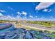 Beautiful community water feature with rocks, waterfalls, and mature landscaping at 1862 Redwood Valley St, Henderson, NV 89052