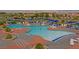 Spacious community pool with ample seating, great for socializing and recreation at 1862 Redwood Valley St, Henderson, NV 89052