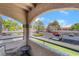 Balcony view overlooking a parking lot, green landscaping, and multiple buildings at 221 Mission Catalina Ln # 104, Las Vegas, NV 89107
