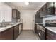 Modern kitchen equipped with stainless steel appliances, sleek countertops, and stylish cabinetry at 221 Mission Catalina Ln # 104, Las Vegas, NV 89107