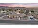 Well-maintained property with picturesque mountain views at sunset at 2251 Thoroughbred Rd, Henderson, NV 89002