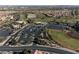 Community aerial view showcasing golf, baseball fields, and a large parking area at 2728 Faiss Dr, Las Vegas, NV 89134