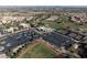 Community aerial view featuring a baseball field, tennis courts, and lush landscaping at 2728 Faiss Dr, Las Vegas, NV 89134