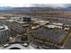 High aerial view of a large shopping complex with vast parking and desert landscaping at 2728 Faiss Dr, Las Vegas, NV 89134