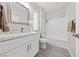 Bright bathroom featuring a vanity with marble countertops and modern fixtures at 2728 Faiss Dr, Las Vegas, NV 89134