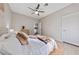 Bedroom featuring a plush bed, ceiling fan, and a bright airy feel at 2728 Faiss Dr, Las Vegas, NV 89134