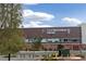 Exterior view of City National Arena with plentiful parking and nicely landscaped bushes and shrubs at 2728 Faiss Dr, Las Vegas, NV 89134