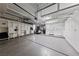 Spacious garage featuring custom storage solutions and a golf cart for convenience at 2728 Faiss Dr, Las Vegas, NV 89134