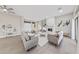 Spacious living room with modern fireplace, stylish decor, and luxury vinyl flooring throughout at 2728 Faiss Dr, Las Vegas, NV 89134