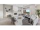 Bright living room with a fireplace, modern decor, and an outdoor view at 2728 Faiss Dr, Las Vegas, NV 89134