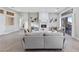 Expansive living room with a fireplace, abundant natural light, and contemporary design elements at 2728 Faiss Dr, Las Vegas, NV 89134