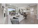 Open-concept living room featuring a fireplace, modern decor, and seamless access to the outdoor pool area at 2728 Faiss Dr, Las Vegas, NV 89134