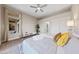 Cozy main bedroom with soft lighting, comfortable bed, and a relaxing window nook at 2728 Faiss Dr, Las Vegas, NV 89134