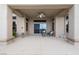 Inviting covered patio with neutral tones and stylish seating, perfect for relaxing outdoors at 2728 Faiss Dr, Las Vegas, NV 89134