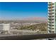 Expansive Las Vegas cityscape with distant mountains, showcasing a golf course and modern architecture at 2877 Paradise Rd # 2502, Las Vegas, NV 89109