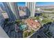 Stunning aerial view overlooking resort-style pool, tennis courts, and lush landscaping at 2877 Paradise Rd # 2502, Las Vegas, NV 89109