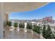Spacious balcony complete with potted plants and seating area shows gorgeous city views at 2877 Paradise Rd # 2502, Las Vegas, NV 89109