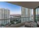 Stunning view of the city from a private balcony, framed by modern high-rise buildings and mountains at 2877 Paradise Rd # 2502, Las Vegas, NV 89109