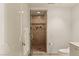 This bathroom features a tiled walk-in shower with glass door and gold fixtures at 2877 Paradise Rd # 2502, Las Vegas, NV 89109