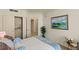 Bedroom with decorative plant, closet, and painting at 2877 Paradise Rd # 2502, Las Vegas, NV 89109