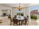 Elegant dining room with city views, chandelier, and seating for six creates a sophisticated ambiance at 2877 Paradise Rd # 2502, Las Vegas, NV 89109