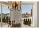 Dining area with city views, chandelier and decorative candles on the dining table at 2877 Paradise Rd # 2502, Las Vegas, NV 89109