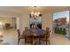 Elegant dining area features a round table and a stunning view of the Las Vegas skyline at 2877 Paradise Rd # 2502, Las Vegas, NV 89109