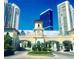 Grand entrance with clock tower, manicured landscaping, and porte-cochère at 2877 Paradise Rd # 2502, Las Vegas, NV 89109