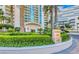 Elegant building exterior with lush landscaping and clear signage at 2877 Paradise Rd # 2502, Las Vegas, NV 89109