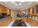 Well-lit kitchen featuring granite countertops and stylish wood cabinetry, perfect for entertaining at 2877 Paradise Rd # 2502, Las Vegas, NV 89109