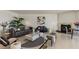 Spacious living room with modern decor, including a gray sofa, fireplace, and stylish accent pieces at 2877 Paradise Rd # 2502, Las Vegas, NV 89109