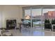 Bright living area with cozy fireplace and expansive windows overlooking the city at 2877 Paradise Rd # 2502, Las Vegas, NV 89109