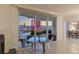 Relax and enjoy a meal overlooking a beautiful skyline in this condo's living space at 2877 Paradise Rd # 2502, Las Vegas, NV 89109