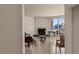 Open living room with a marble fireplace, floor to ceiling windows with captivating city views at 2877 Paradise Rd # 2502, Las Vegas, NV 89109