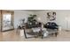 Stylish living room with modern furniture, artwork, and a display case for a sophisticated look at 2877 Paradise Rd # 2502, Las Vegas, NV 89109